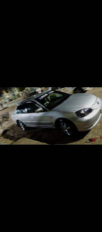 Civic 2004 model hai Bahar se shower hai Ander se original haii