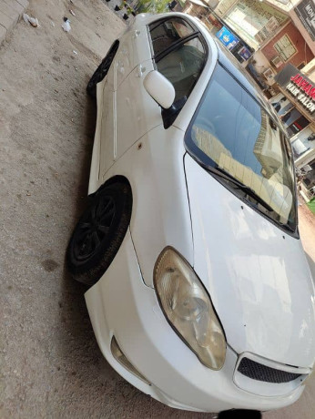 Toyota Corolla GLI 2006 auto pearl White golden number