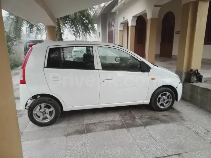 Daihatsu Mira 2003